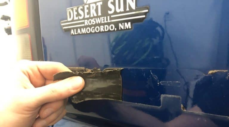 Best way to remove dealership sticker or emblem from car paint.